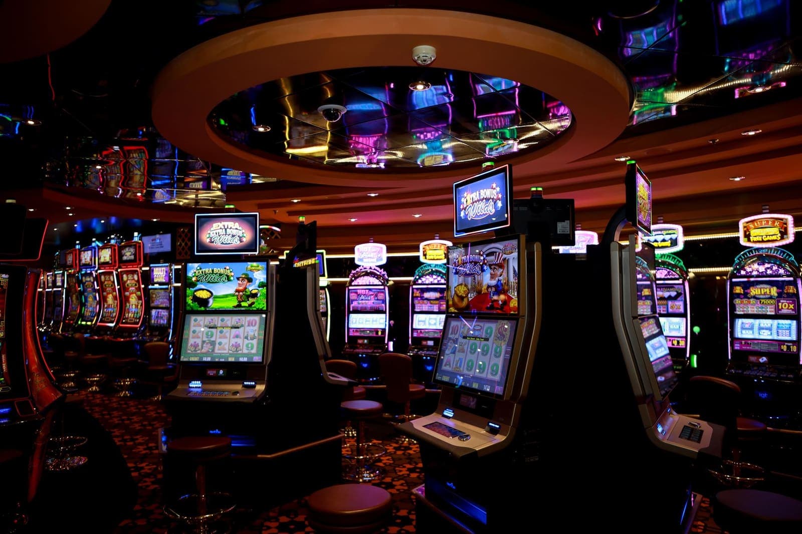Slot machine reels showing colourful game symbols mid-spin