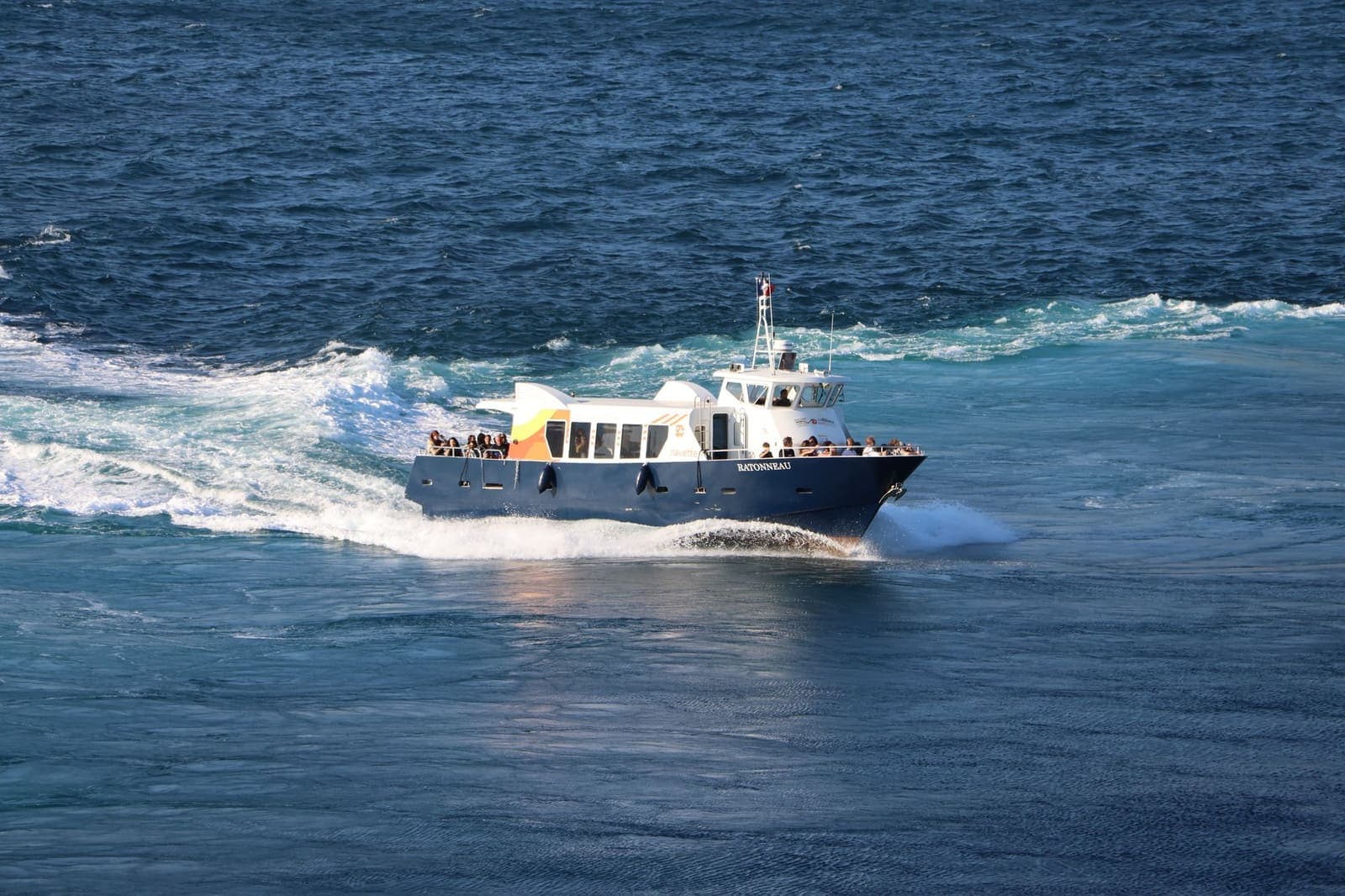 A high-speed passenger ferry crossing open water